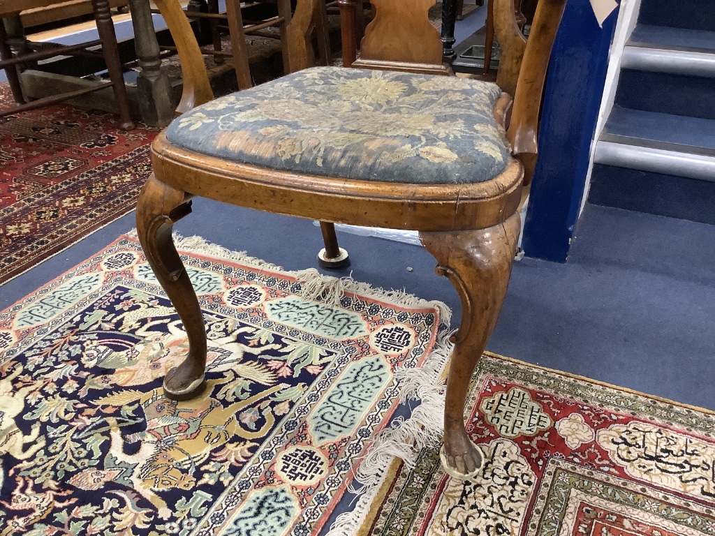 A Queen Anne revival walnut elbow chair